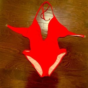Red one piece with cutouts